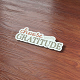 Thanksgiving Choose Gratitude Sticker on Wood Desk in Office