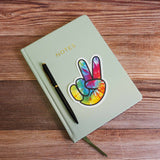 cute hippie sticker on journal