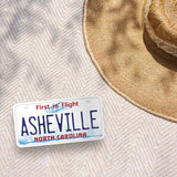 Asheville NC Sticker Outdoors on Beach Blanket