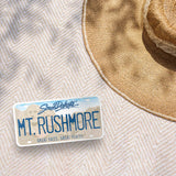 Mount Rushmore South Dakota License Plate Sticker Outdoors on Blanket