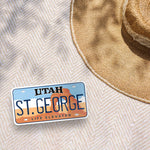 St George UT Bumper Sticker Outdoors on Beach Blanket