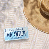 Warwick Rhode Island License Plate Sticker on Beach Blanket