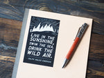 Drink the Wild Air Quote Sticker on Notebook