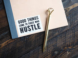 Hustle Sticker on Notebook