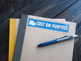 Lost on Purpose Adventure Sticker on Notebook