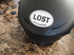 Lost on Purpose Adventure Sticker, 3" White Oval on Motorcycle Helmet