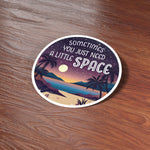 Just Need A Little Space Camping Sticker on Wood Desk